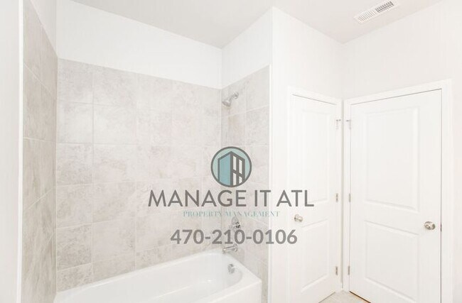 Building Photo - Elegant 4 Bedroom Townhome in Prime Location near HWY 285 in Doraville