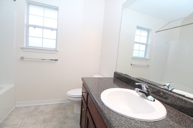 Building Photo - Spacious 4BR Home in Robin's Ridge with Soaring Ceilings, Guest Suite & Two-Car Garage