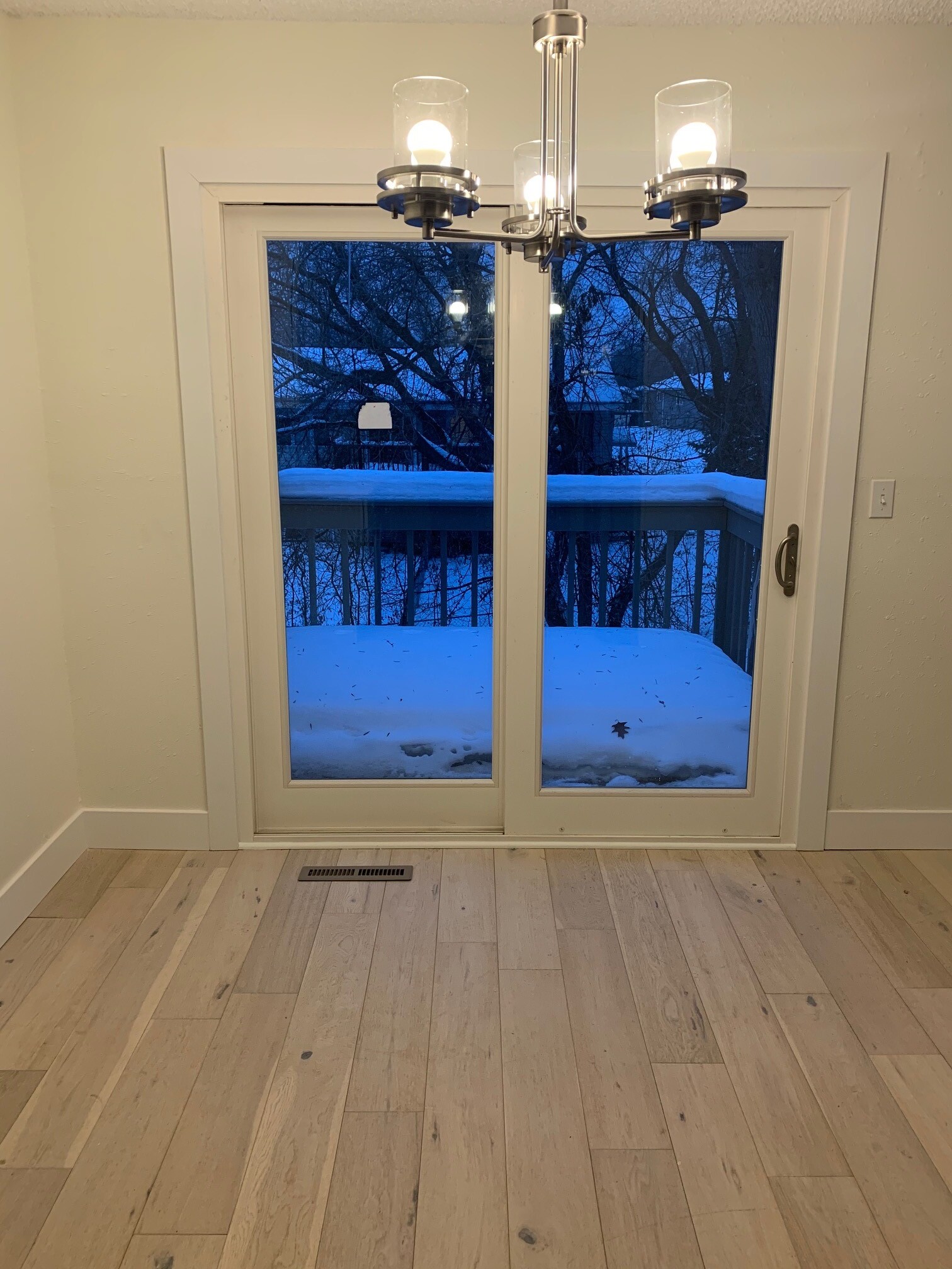 Sliding patio door leads out to private deck. - 6224 Magnolia Ln N