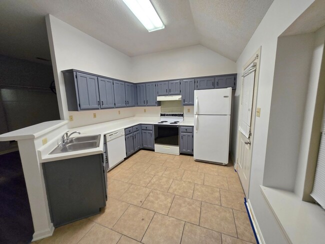 Building Photo - For lease- 3 bedroom,  2 bath home w/2 car garage