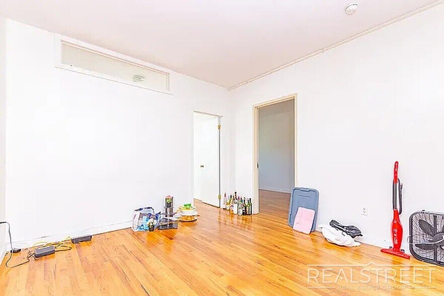 Building Photo - Massive Outdoor Patio | Spacious 3BR/2BA Apartment in Bushwick–East Williamsburg
