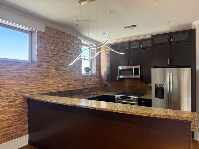 Building Photo - Completely Renovated Downtown Memphis Loft with Rooftop Skyline Views.