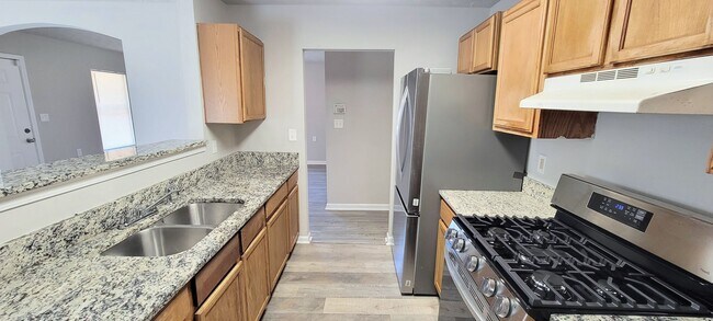 Building Photo - Charming 4BR Home with Modern Upgrades & Spacious Yard