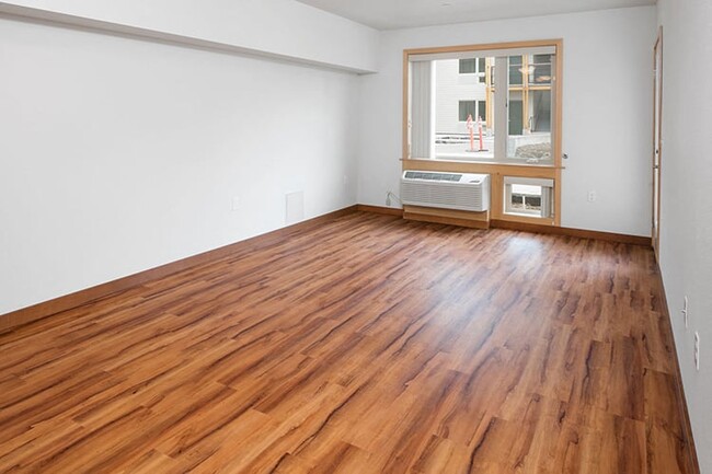 All homes feature durable wood laminate flooring. - NAYA Generations