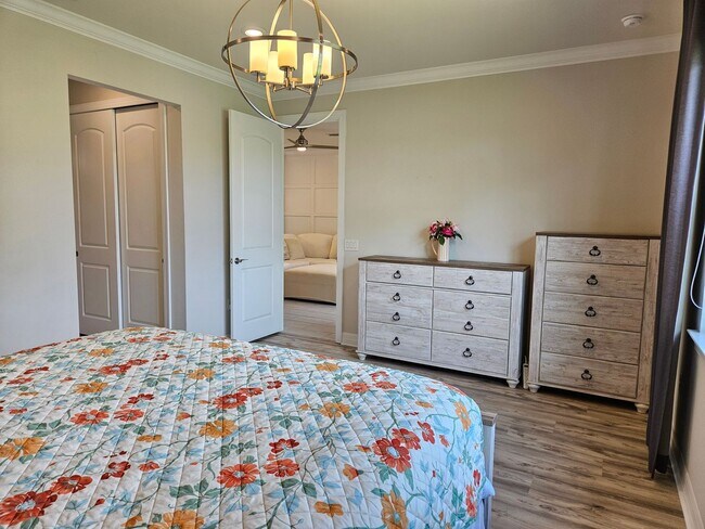 Building Photo - Stunning Model Home – 2 Bedrooms plus Den,...