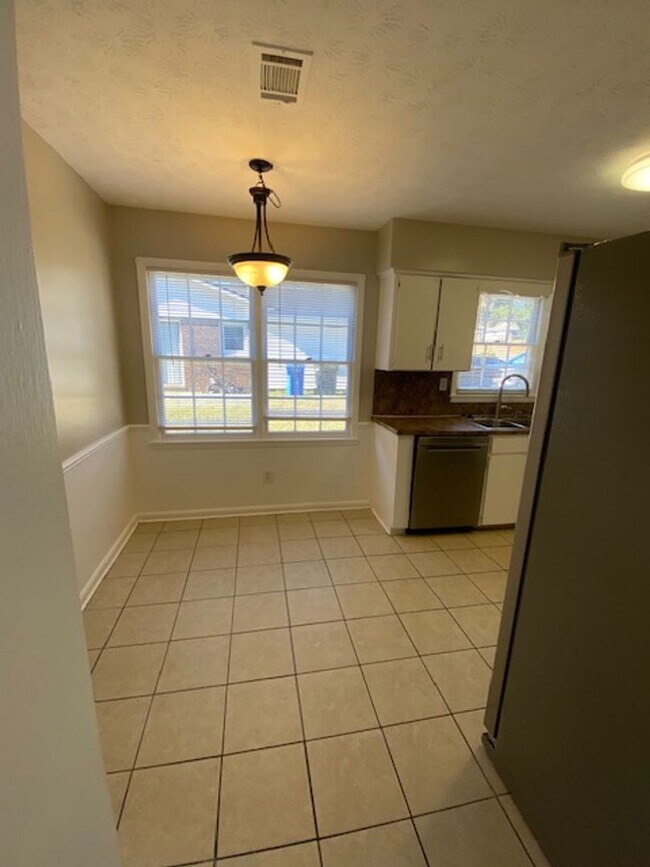 Building Photo - A Quiet Location, $200 Move-N-Special