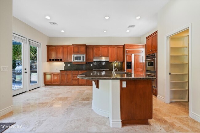 Building Photo - 6077 Mandeville Pl