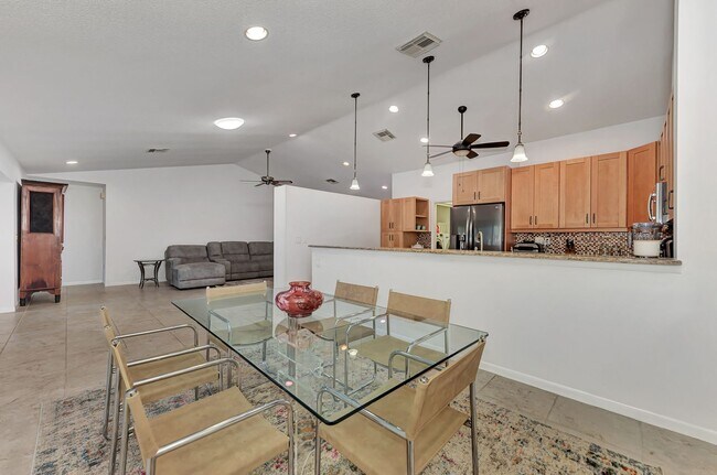 Building Photo - BEAUTIFUL 2 BEDROOM 2 BATHROOM + A DEN VILLA WITH GORGEOUS LAKE VIEWS!