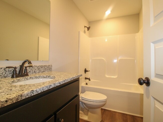 Building Photo - 4 BR - 3 Baths -  Cable, Internet & Lawn-care and Pest Control Included!