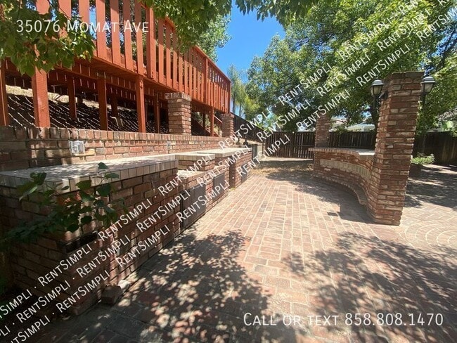 Building Photo - 35076 Momat Ave