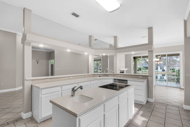 Building Photo - MOVE IN SPECIAL: 30% OFF FIRST MONTHS RENT -- Spacious unfurnished 4B/3B home in Gated Community ...