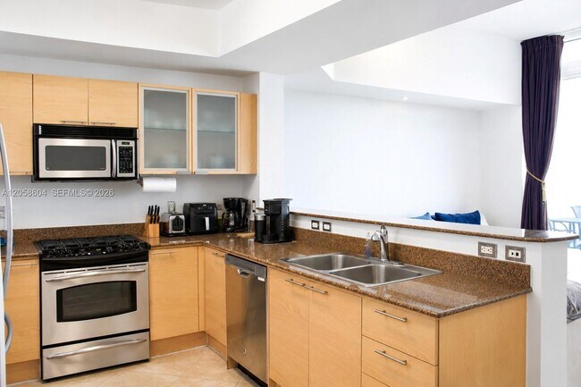 Building Photo - 16699 Collins Ave