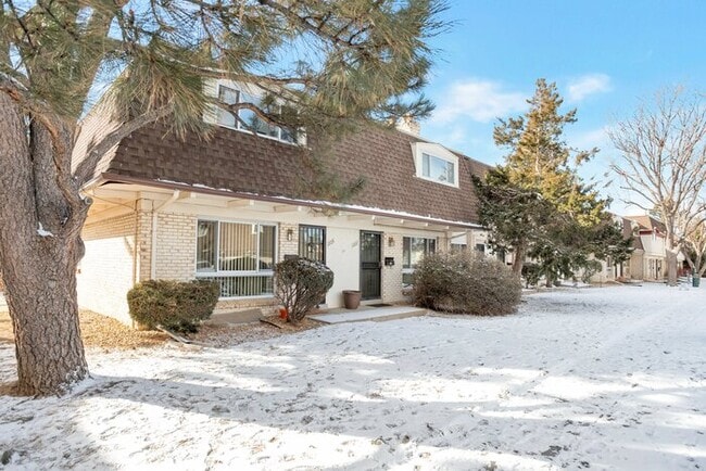 Primary Photo - Inviting Townhome w/ 2-car Carport off the...