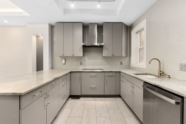 Building Photo - Experience stunning design and modern finishes in Columbia Heights!