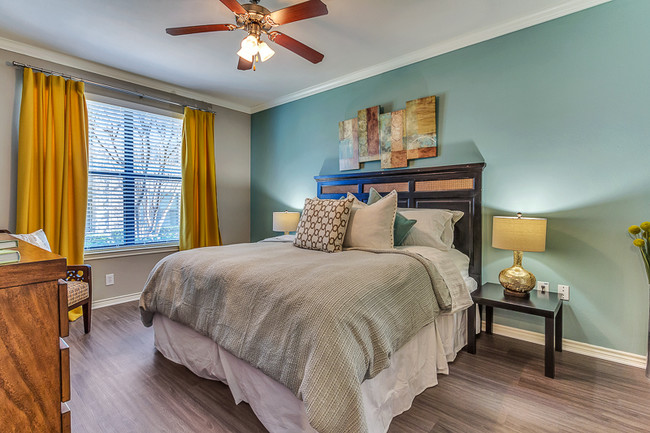 Large Master Bedroom with Lots of Natural Light and hard wood floors - Aspire Mckinney Ranch