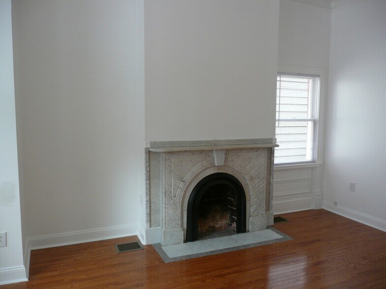Living Room - View 2 - Non working fireplace - 225 Emerson St
