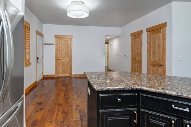 Building Photo - Unfurnished Condo Retreat with Modern Comf...