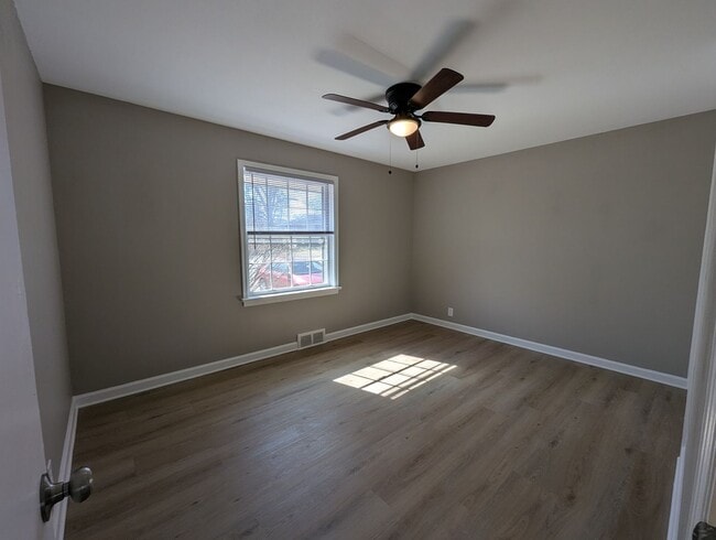 Building Photo - Fully Renovated Home with Sunroom, Garage & Huge Fenced Yard