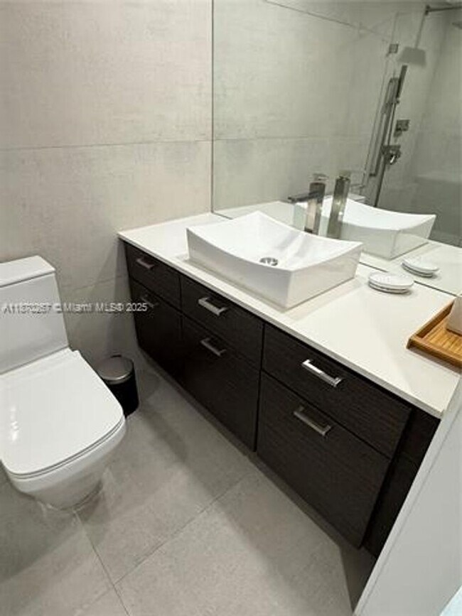 Building Photo - 5900 Collins Ave