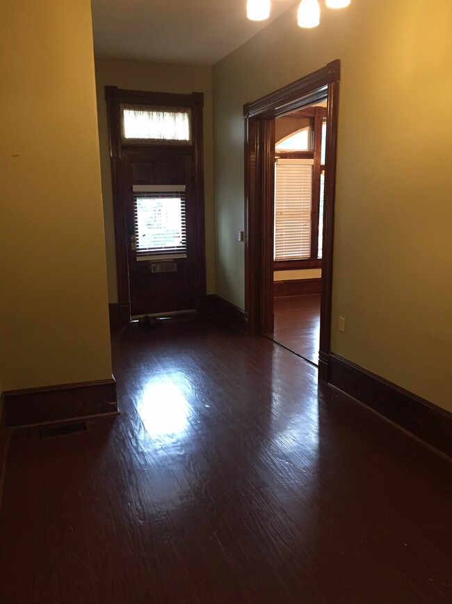 Front Door w/pocket door to living room - 1520 S Louisiana St