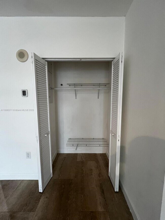 Building Photo - 10275 Collins Ave