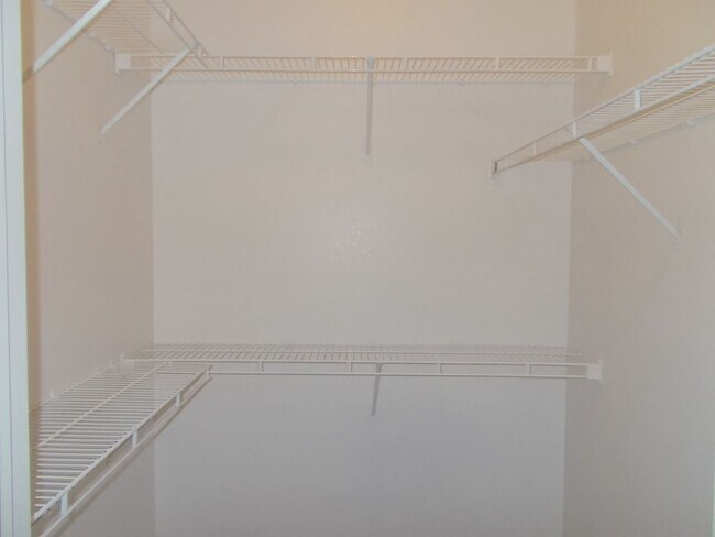Building Photo - Bright Ground-Floor Condo in Gated Traverse Point with Pool & Spa Amenities