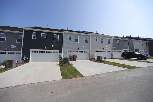 Building Photo - Beautiful 3 Bed+Bonus+2 Car Garage Townhome in New Wake Forest Community