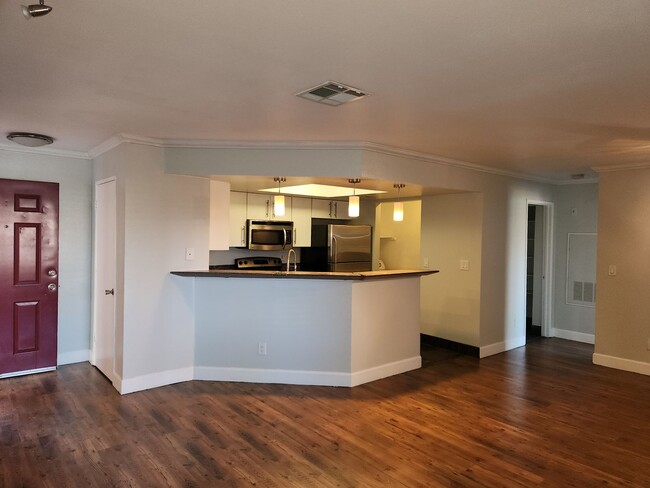 Primary Photo - Second floor condo overlooking pool.