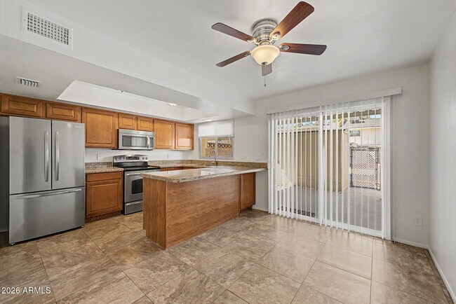 Building Photo - 8510 E Montebello Ave