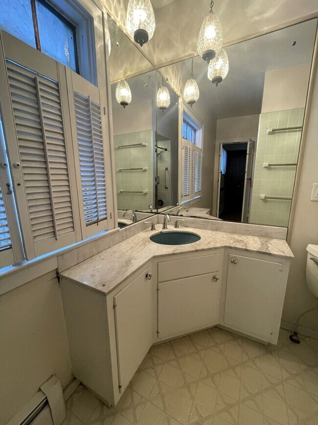 Building Photo - One Block to the Diag! Charming Home with Private Courtyard + Parking