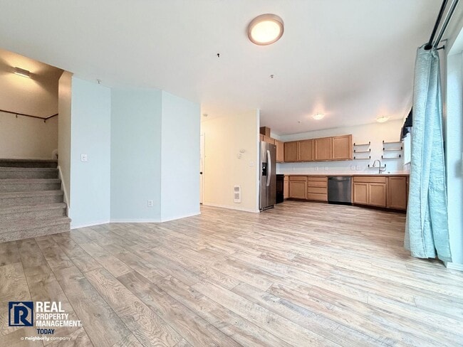 Building Photo - Spacious 4-Bedroom Townhome in Alicia Meadows | Garage, Patio & Pet Friendly
