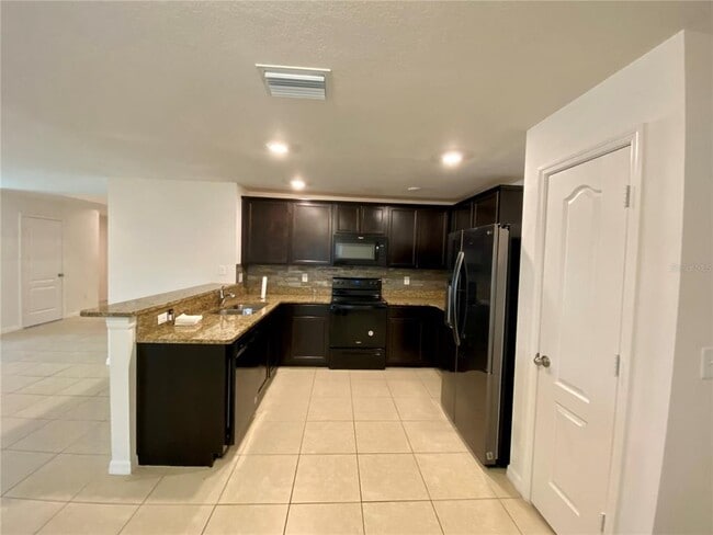Building Photo - 8659 Silverbell Loop