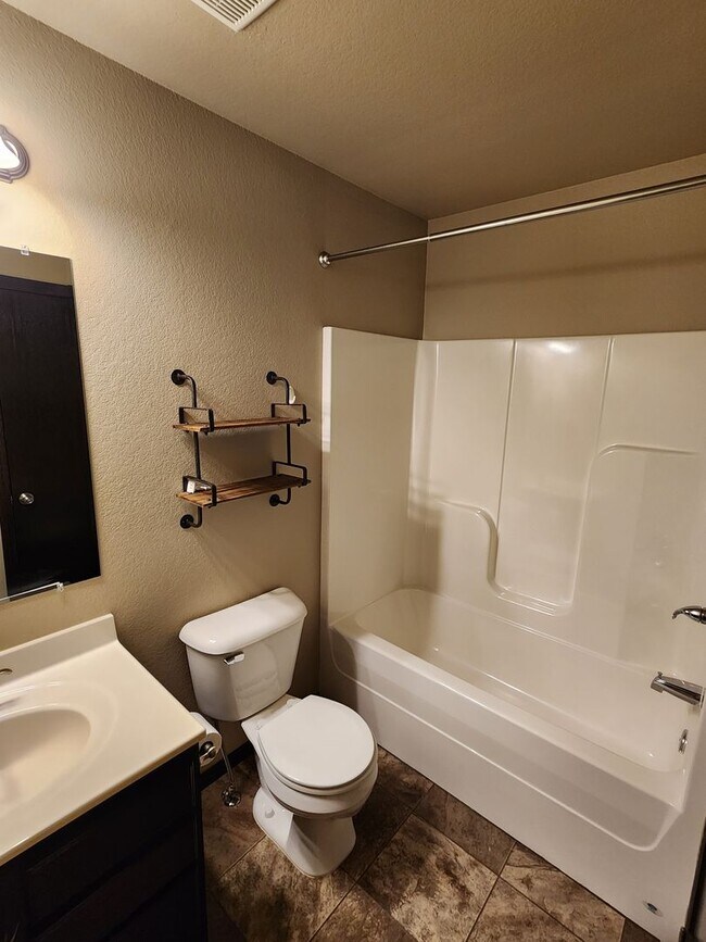 Building Photo - ** SPECIAL MOVE-IN OFFER ** 4 Bedroom, 3 B...