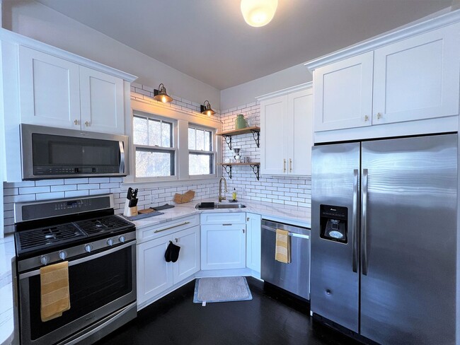 Building Photo - HISTORIC 4TH & GILL BUNGALOW STYLE HOME WITH FRONT PORCH!