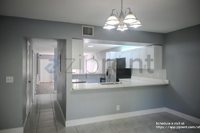 Building Photo - 9761 Riverside Dr