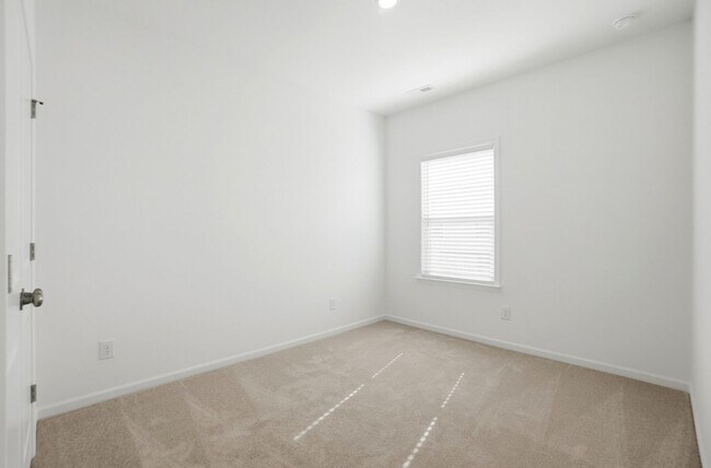 Building Photo - Brand-New Townhome in the University area at Senata at Research Park!
