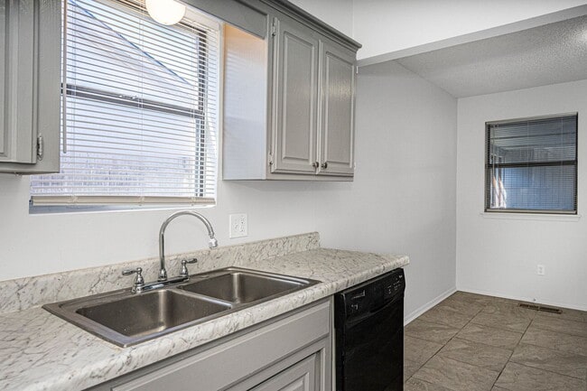 Building Photo - Corner-Lot 3Bedroom Charmer in Yukon with Fireplace & Enclosed Patio!