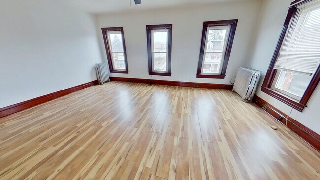 Building Photo - Second-Floor Apartment with Off-Street Parking - MOVE IN SPECIAL