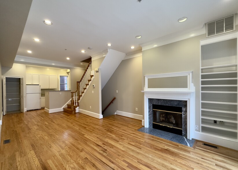 Main living area with gas fireplace - 2529 K St NW