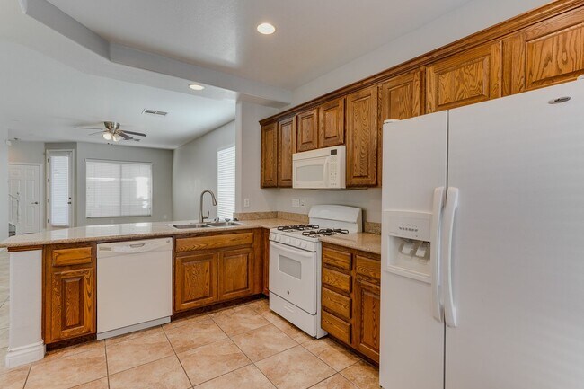 Building Photo - Gated Townhome with Strip Views from the Balcony!