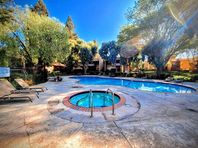 Building Photo - Beautiful 2bd Condo In Gated Community With Pool, Gym, and On-site Laundry