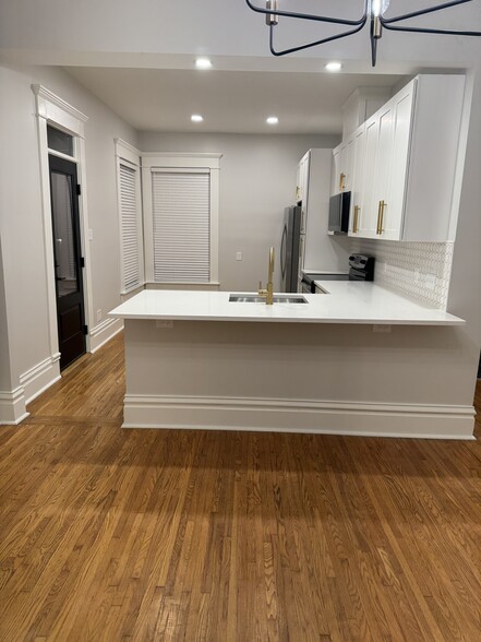 New kitchen as seen from dining room - 1049 Franklin Ave