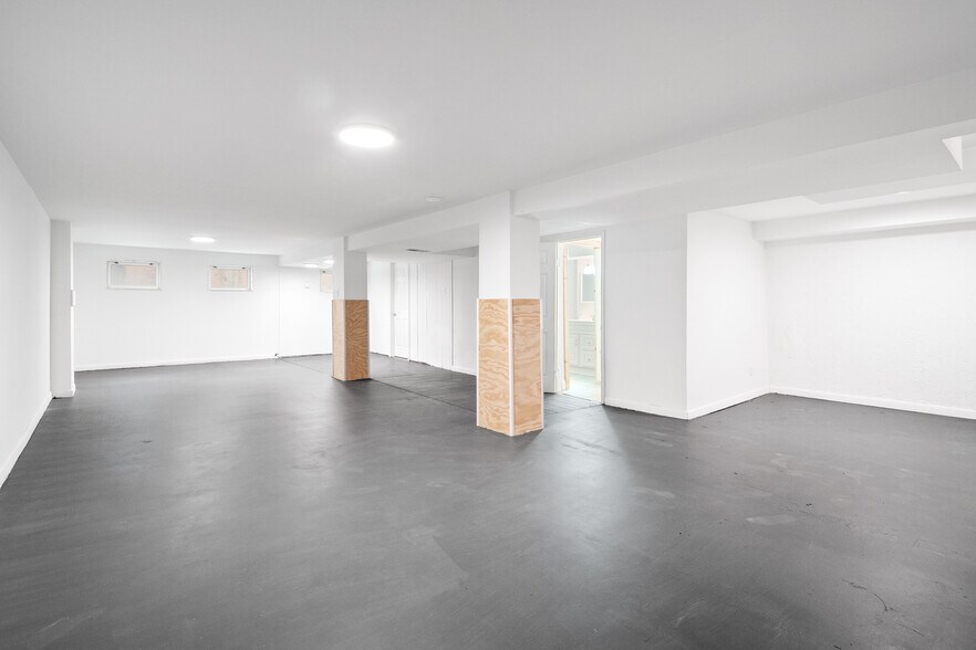 Large rec room area in lower level - 620 Saint Bernard Dr