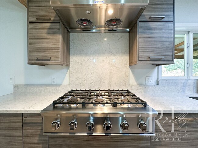 Building Photo - Mid-Century Modern Dream Home with Chef’s ...