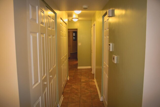 Hallway with closets on the left - 1535 9th St NW
