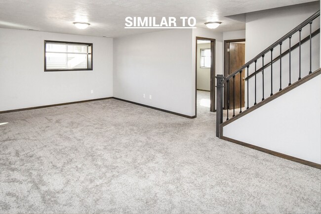 Building Photo - East Sioux Falls 4-Bedroom Townhome – Style, Space & Convenience!