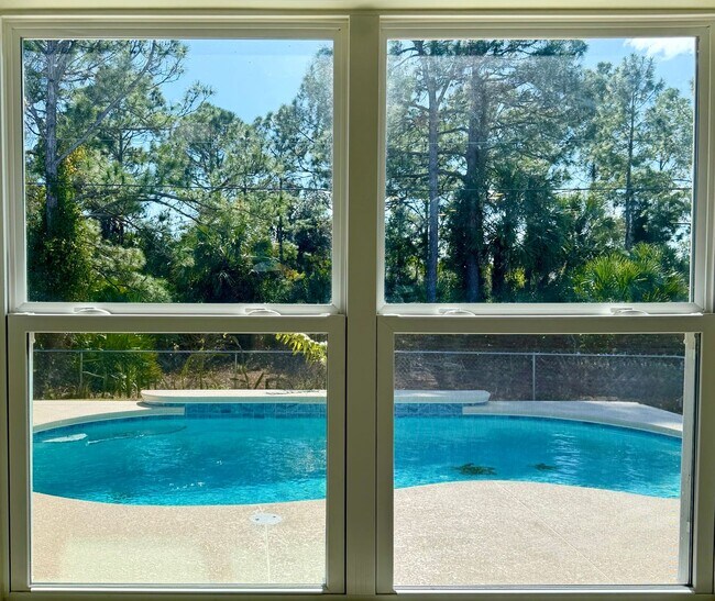 Building Photo - Palm Bay Pool Home Stunner!