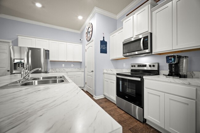 Building Photo - Spacious 4-Bedroom Home with Fenced Yard & Community Amenities – Available June 30th!