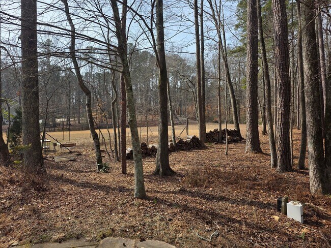 Building Photo - Private 4 bed 3 bath home located in Marietta on 4.5 acres