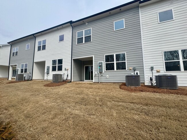 Building Photo - NEW CONSTRUCTION;3BR/2BA Townhome in Griffith Lakes